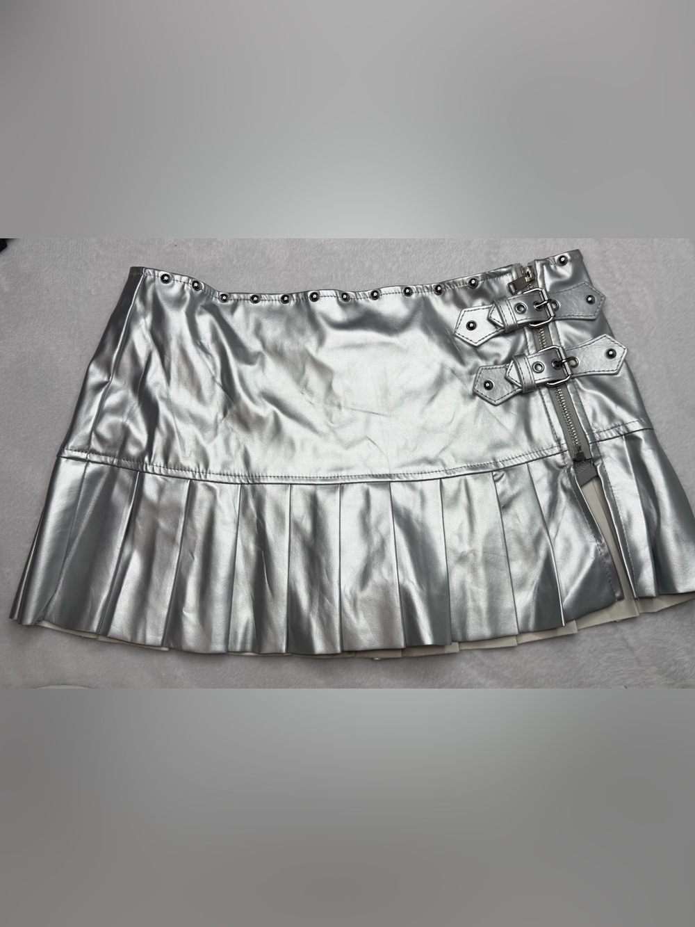 Silver Pleated Faux Leather Mini Skirt with Buckle Detail
